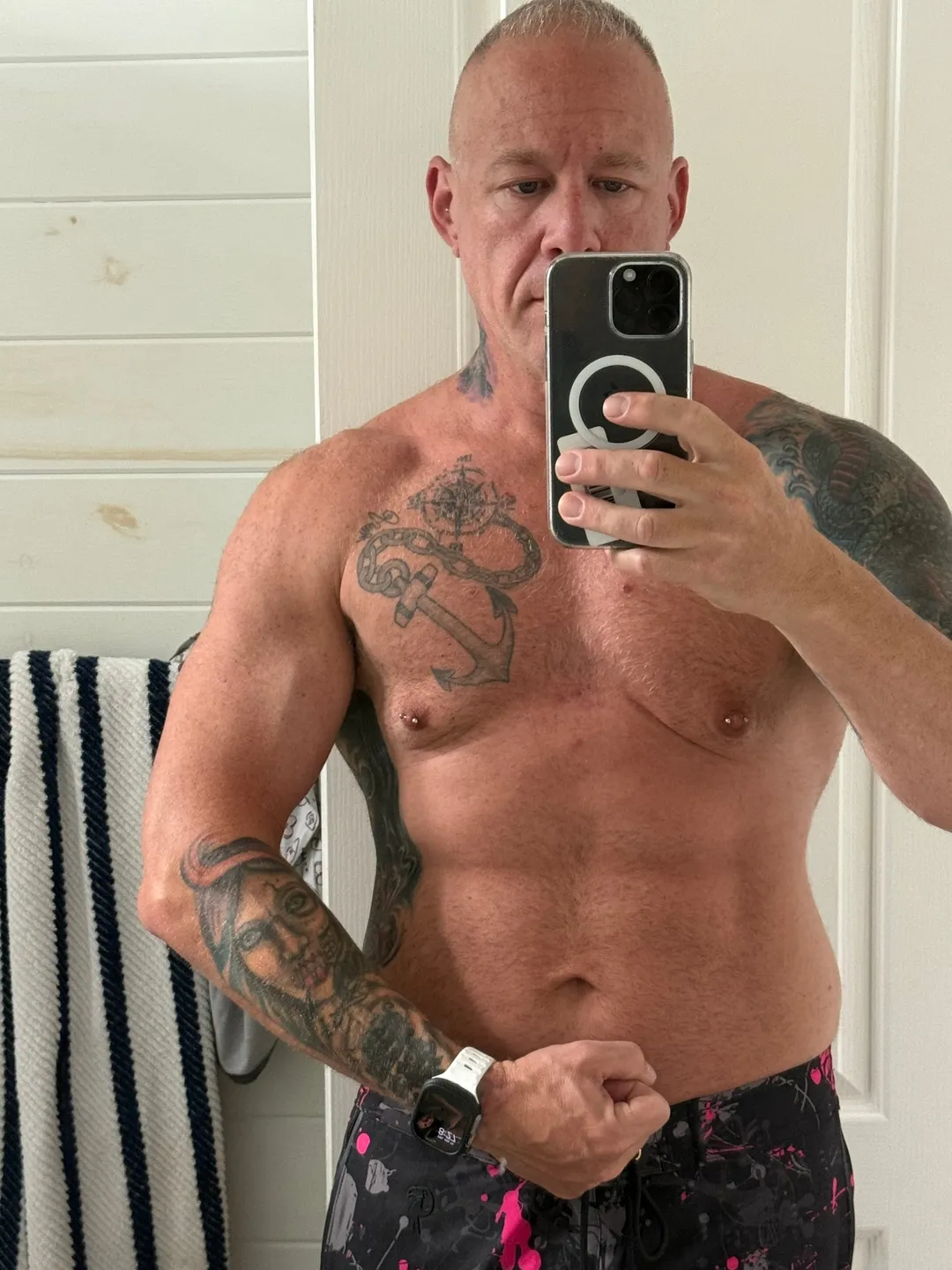 Customer photo from Michael G. wearing Splatter Swim Shorts Blue 5 inch