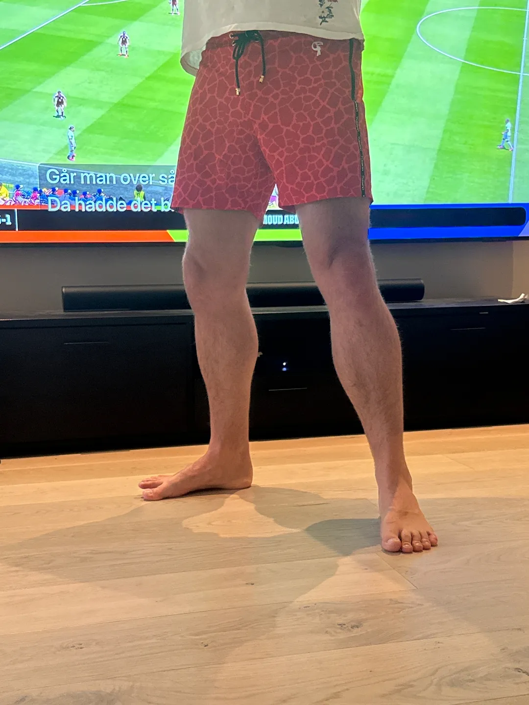 Customer photo from Eskil N. wearing Splatter Swim Shorts Blue 5 inch