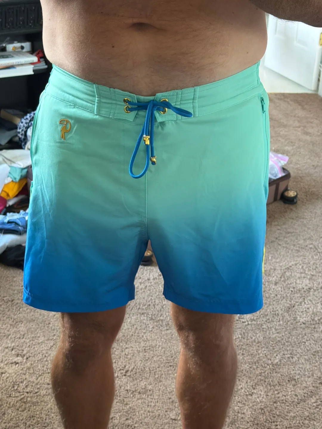 Customer photo from Jason S. wearing Faded Ocean 5 inch swim trunks