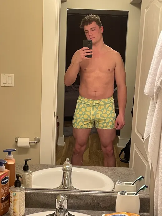 Customer photo from Matthew R. wearing Lemon White Swim Shorts