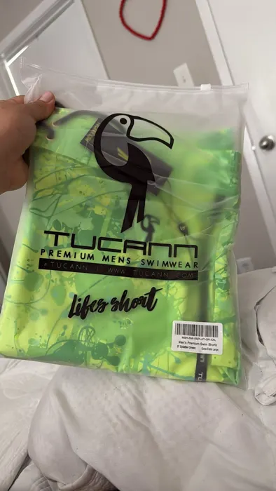 Customer photo from Ana V. review of Splatter Swim Shorts Green - 5"
