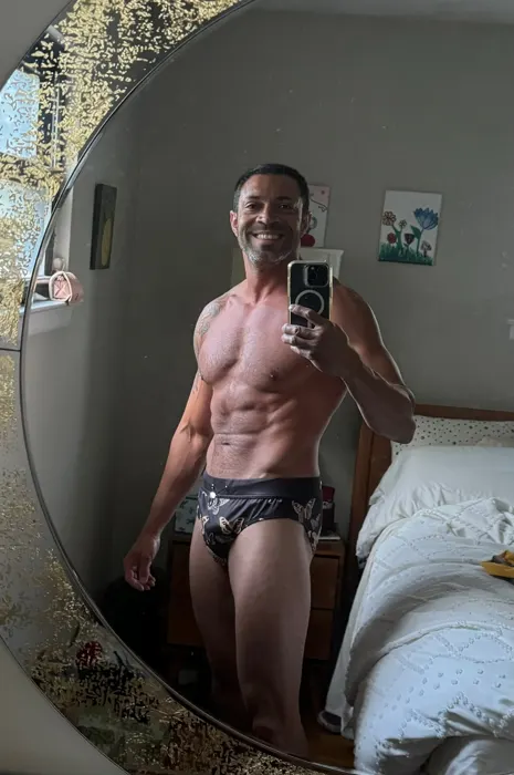 Customer photo from Darrius S. wearing Golden Butterfly Briefs
