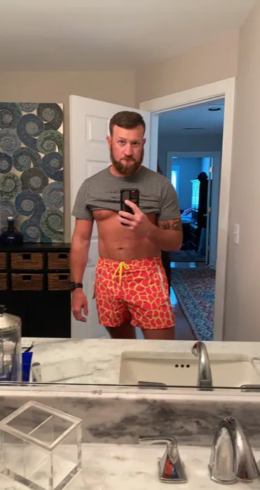Customer photo from Robert Z. review of Giraffe Print Fluro Swim Shorts