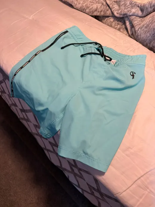 Customer photo from Ruben S. wearing Fluro Aqua - 7"
