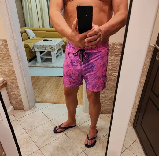Customer photo from Milen M. review of Splatter Swim Shorts Purple - 5"