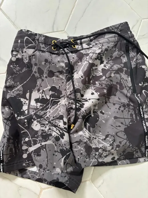 Customer photo from Nick A. review of Splatter Swim Shorts Black - 5"