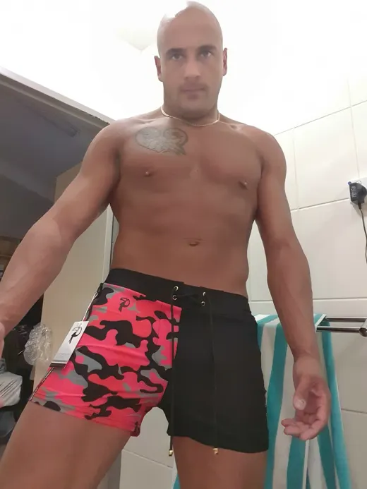 Customer photo from Greg C. review of Split Camo Red Swim Shorts - 3"