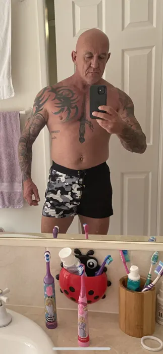 Customer photo from Mark W. review of Split Camo Black - 3 Inch Swim Shorts