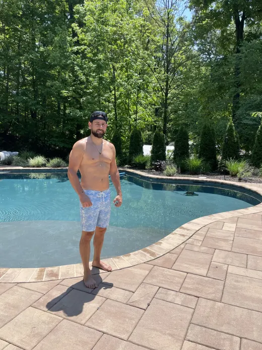 Customer photo from Brian V. review of Make Waves Blue Swim Shorts - 7"