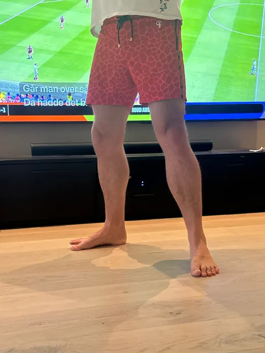 Customer photo from Eskil N. wearing Splatter Swim Shorts Blue - 5"