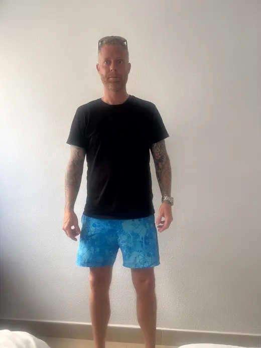 Customer photo from Joel C. review of Splatter Swim Shorts Blue - 5"