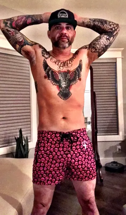 Customer photo from Robert O. wearing Skull Island Black Swim Shorts