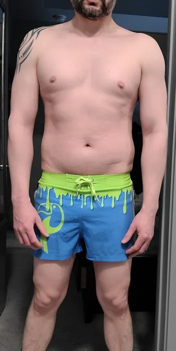Customer photo from Anthony M. review of Drip Series Swim Shorts - Green Drip