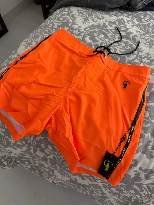 Customer photo from Marcelo D. wearing Fluro Orange V2 - 5"