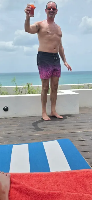Customer photo from April R. review of Black Leaf Magenta Swim Trunks - 5"