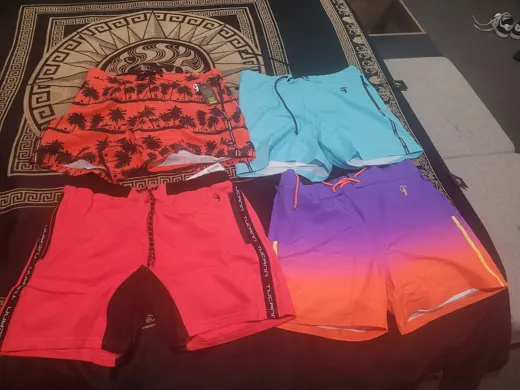 Customer photo from Shane S. review of Faded Crimson Swim Shorts - 5"